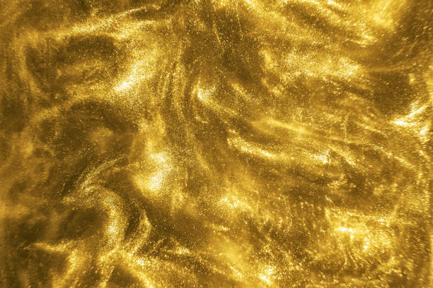 istock gold glitter shimmering magic bokeh background 1189361540