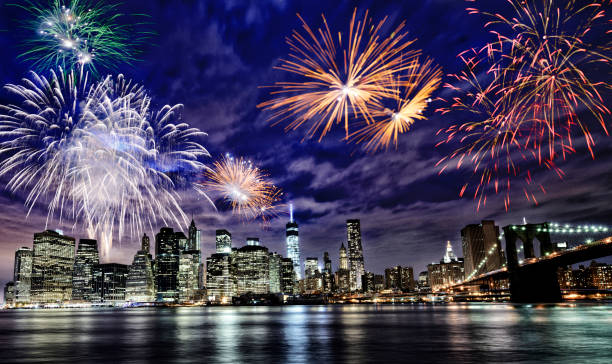 istock Fireworks on NYC Skyline and Brooklyn Bridge. Manhattan Financial District. 1189363460