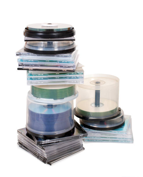 piles of obsolete cds and dvds isolated with clipping-path - dvd obsolete cd cd rom imagens e fotografias de stock