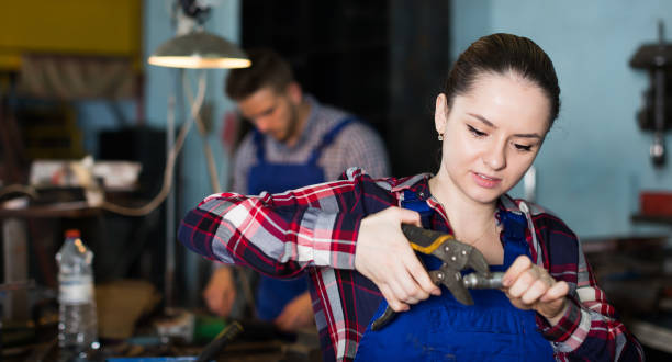 istock Pretty female standing on her workplace 1189363781