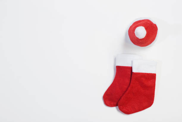 istock red santa hat and socks  on white background 1189364863