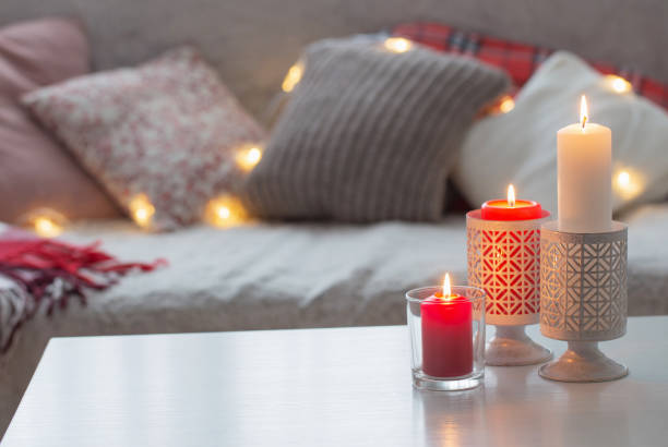 istock Composition of candles on  white table against the background of 1189364993