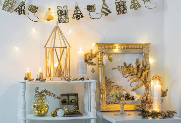 istock Christmas golden decor in white interior 1189364997