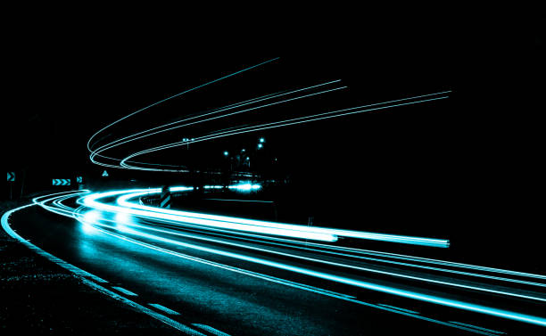 istock lights of cars with night 1189365421