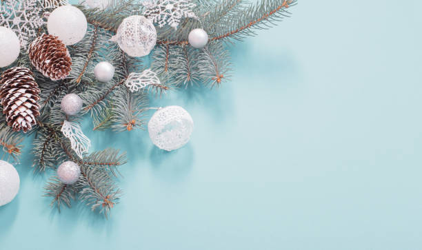 istock Christmas decorations on blue paper background 1189371398