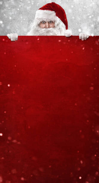 Santa Claus Showing Something On a Red Wall
