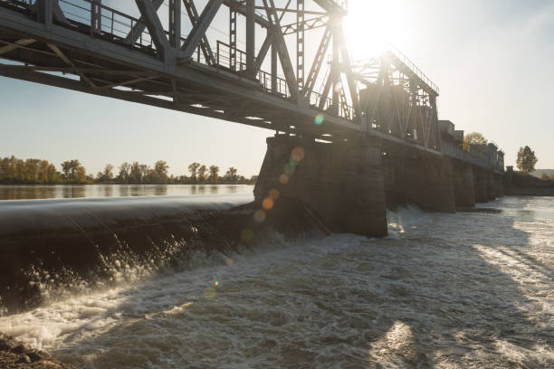 istock dam heat station on the river with a railway bridge 1189373147