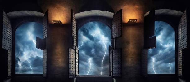 istock Window view of sparkling lightning in the old town. 1189376859