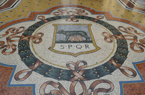 istock Loba Romulo and oar engraving on ground Milan Cathedral, Italy 1189378883