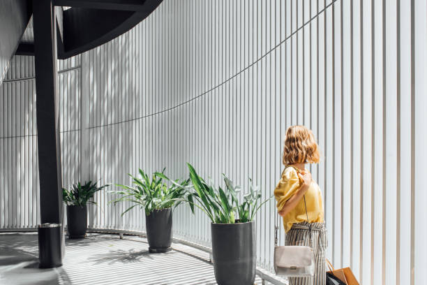 istock A Woman Walking at Shopping Mall 1189380294