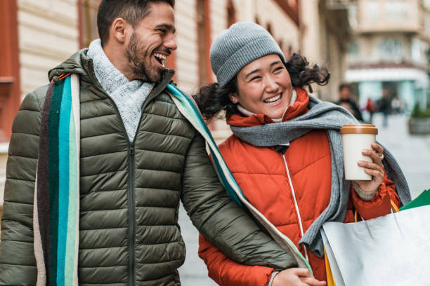 istock Young couple with shopping bags 1189380330