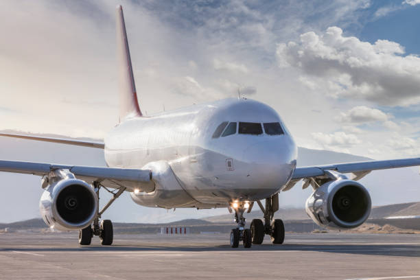 istock Passenger Arplane On Airport Runway 1189382184