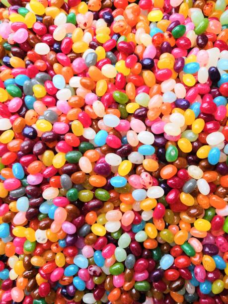 istock Multicolored background made of various colorful candies. Space for text, party, candy bar, childhood 1189384696