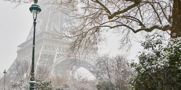 istock Scenic view to the Eiffel tower on a day with heavy snow 1189389510