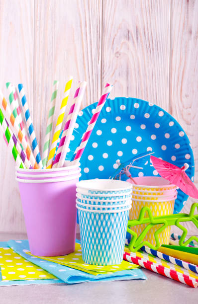 istock Kids party concept - paper cups, straws, plates 1189390276