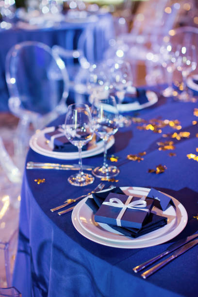 istock Beautiful table setting with white and green flowers. Space theme wedding decorations 1189392554