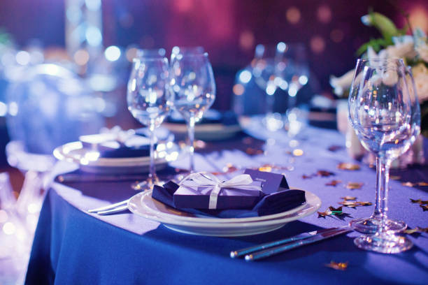 istock Beautiful table setting with white and green flowers. Space theme wedding decorations 1189392604