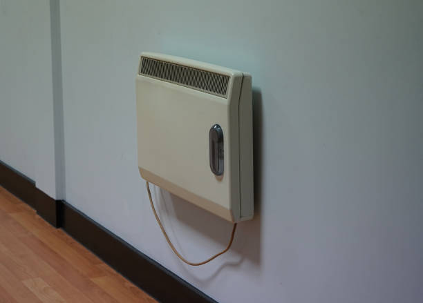 istock Heat-store heater mounted on a white wall 1189392871