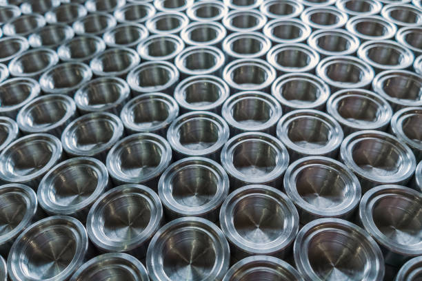 istock Shiny metal parts after cnc turning, on flat surface selective focus composition background 1189393645