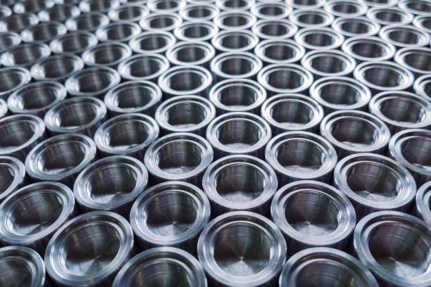 istock Shiny metal parts after cnc turning, on flat surface selective focus composition background 1189393675