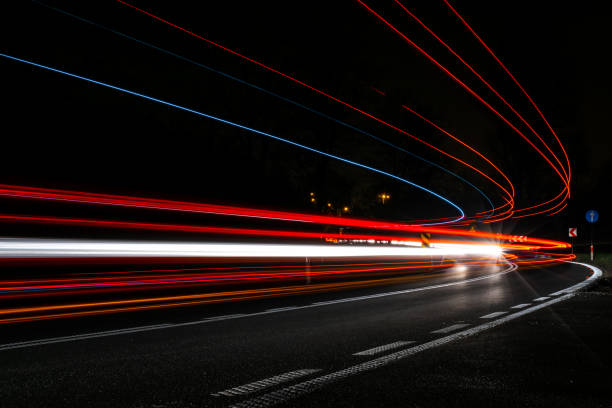 istock lights of cars with night 1189393781