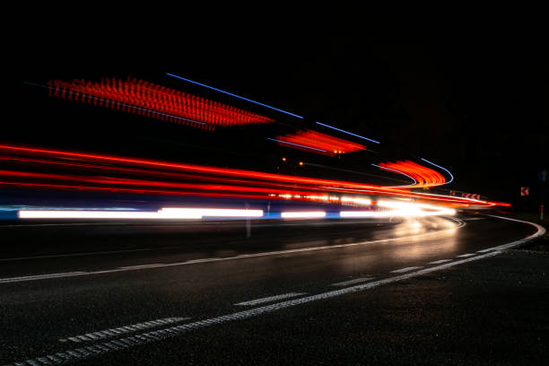 istock lights of cars with night 1189393782