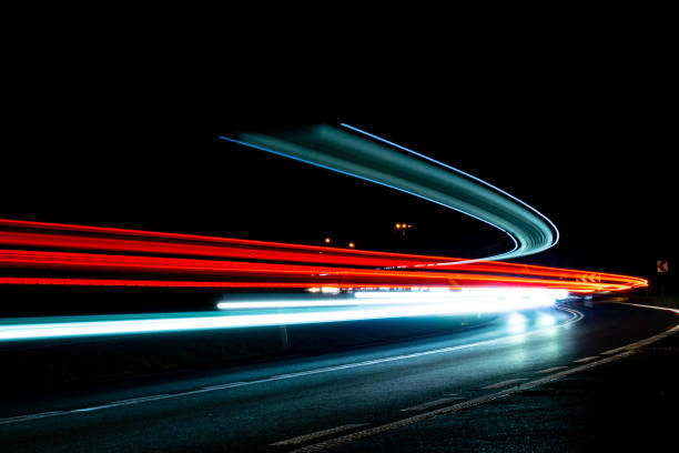 istock lights of cars with night 1189393787