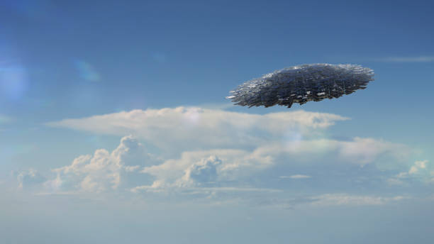 istock UFO, alien spaceship flying through the clouds 1189396899