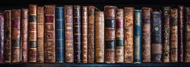 istock Old books on wooden shelf. 1189397041