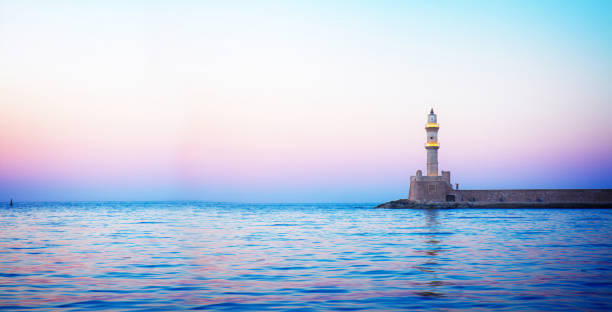 istock lighthouse of Chania at pink sunset, Crete 1189397133
