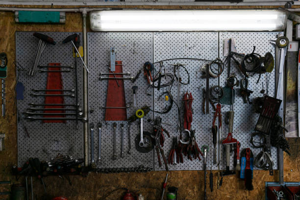 istock Car tools on the wall. Auto mechanic garage with workshop tools wall. Repair concept. 1189397952