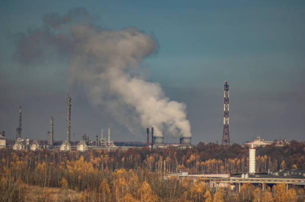 istock Factories in an industrial area among the forest 1189402879