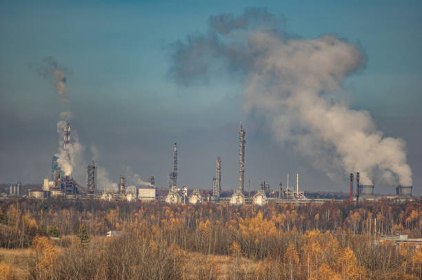 istock Factories in an industrial area among the forest 1189403738