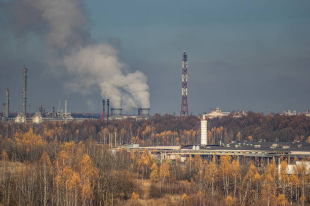 istock Factories in an industrial area among the forest 1189403872