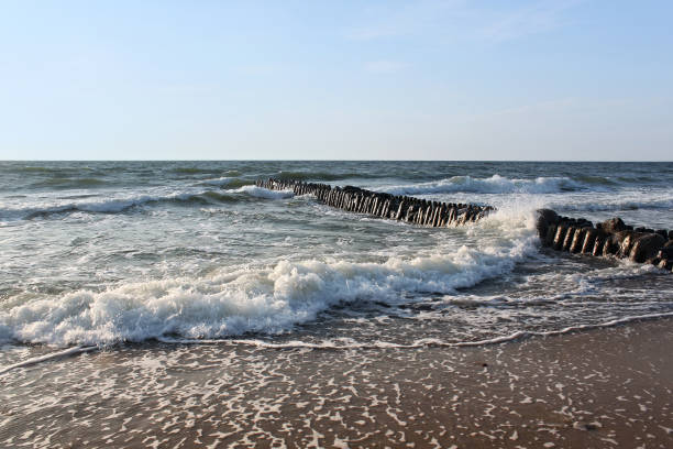 istock Old german breakwater on the Baltic Sea coast at summer. 1189405258