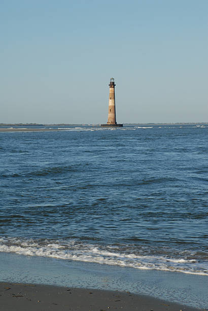 istock Atlantic tide rolls ashore near Morris Island Lighthouse 118940572