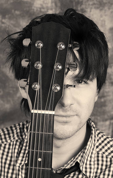 istock Guitarist portrait black and white 118940732
