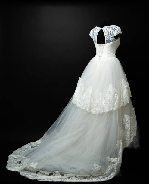 istock white wedding dress on black background in studio 1189407949