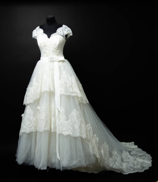 istock white wedding dress on black background in studio 1189407961