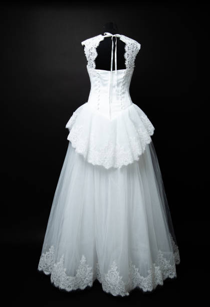 istock white wedding dress on black background in studio 1189408001