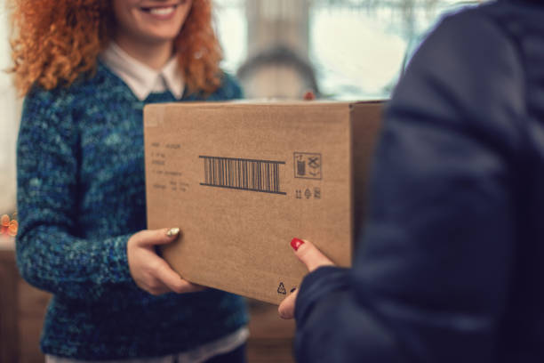 istock Young girl getting parcel on Christmas 1189411083