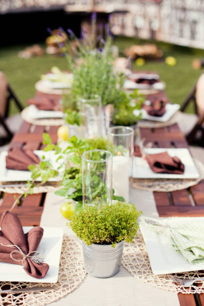 istock table setting in rustic style with herbs, apples and brown napkins 1189418035