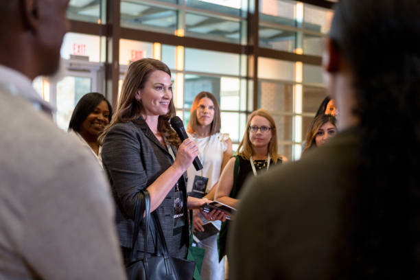 istock Confident conference speaker answers questions 1189420419