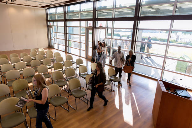 istock Business people enter conference venue 1189420868