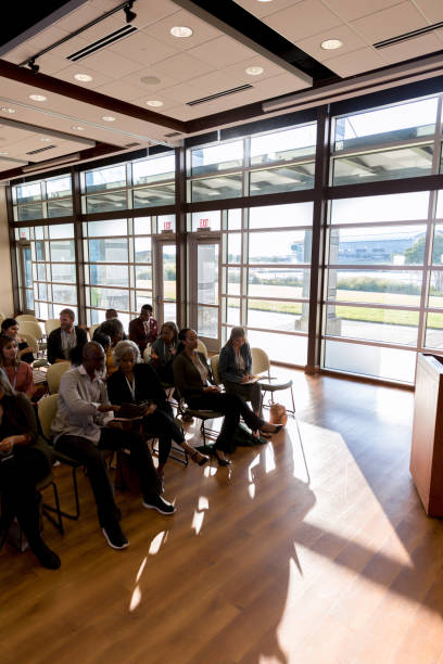 istock Group of business people ready for a conference 1189420941