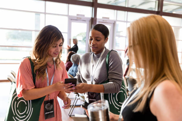 istock Friends attend conference together 1189420948