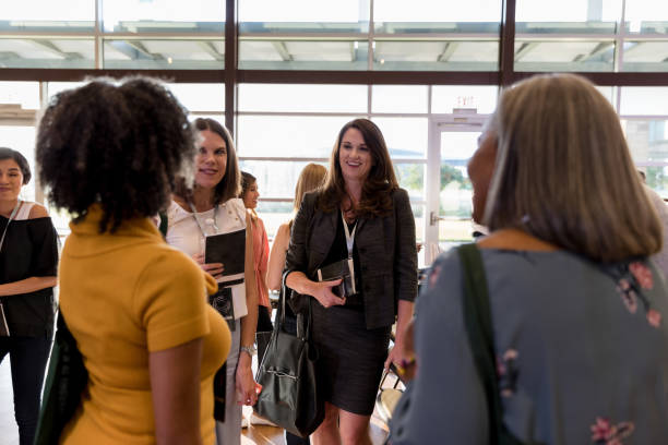 istock Attentive businesspeople talk with conference speaker 1189420951