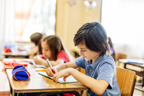 istock Elementary education in Latin America - school children having test 1189422533