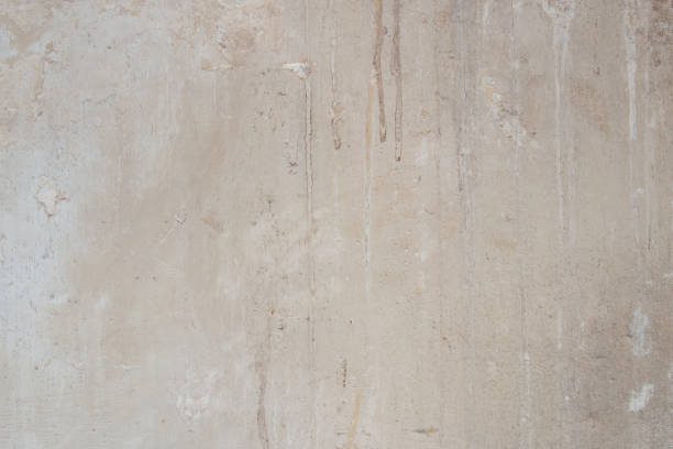 istock generic background of a marbled concrete wall or floor surface stained of age and usage oved a long period of time in light beige colors 1189422604