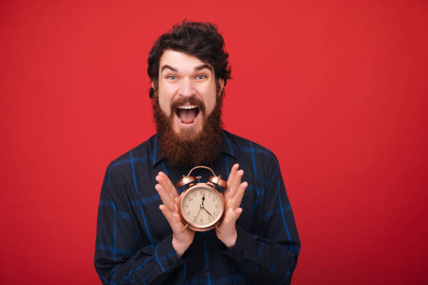 istock Photo of man  with beard ready start working. Time to work. Red isolated background 1189423331